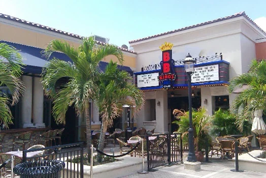 B.B. King’s Blues Club entrance with palm trees and an outdoor seating area