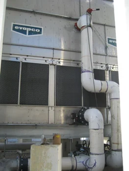 Cooling tower equipment with connected piping and metal service panels