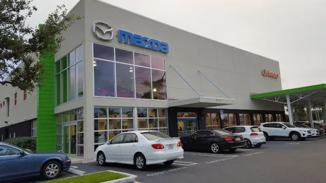 Grieco Mazda dealership exterior in Delray Beach with a glass showroom frontage