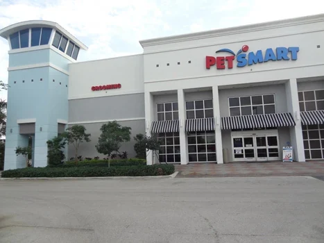 PetSmart storefront with a blue corner tower and covered entrances